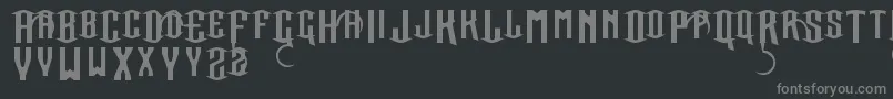 フォントSacredRights – 黒い背景に灰色の文字