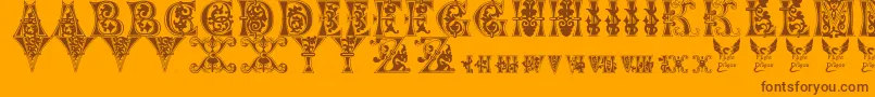FloralMajuscules11thC.-Schriftart – Braune Schriften auf orangefarbenem Hintergrund