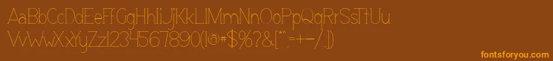 Espacio Font – Orange Fonts on Brown Background