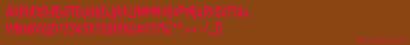 JollylodgerRegular Font – Red Fonts on Brown Background