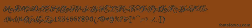 Fonte VtcTattooscripttwo – fontes pretas em um fundo marrom