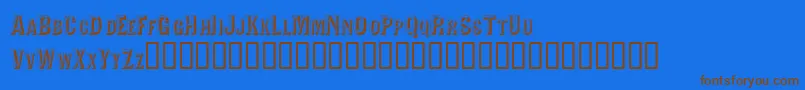 フォントValdivafacetsscapsssk – 茶色の文字が青い背景にあります。