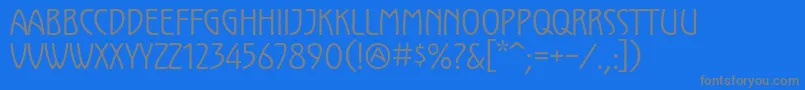 Fonte KololpstdNarrow – fontes cinzas em um fundo azul