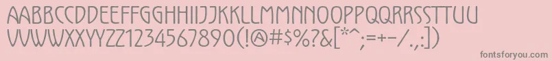 Czcionka KololpstdNarrow – szare czcionki na różowym tle