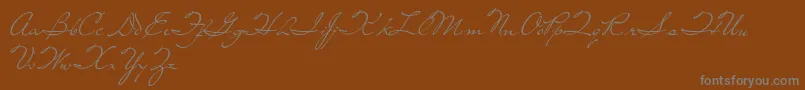 LivingTogether-Schriftart – Graue Schriften auf braunem Hintergrund