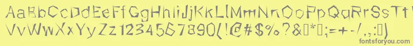 フォントKungfool – 黄色の背景に灰色の文字