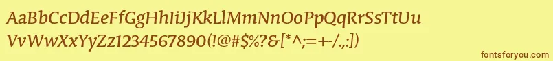 フォントCongabravastdRegular – 茶色の文字が黄色の背景にあります。