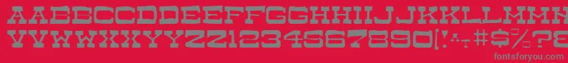 DryGoodsAntiqueJl Font – Gray Fonts on Red Background