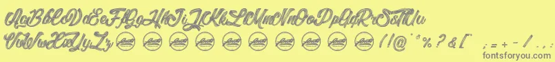 Fonte LitchisIslandPersonaluseonly – fontes cinzas em um fundo amarelo