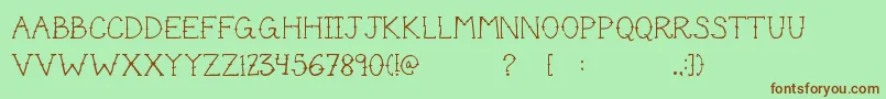 Cutetat Font – Brown Fonts on Green Background