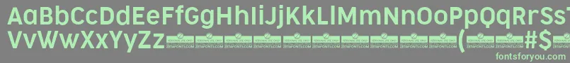 CocogooseNarrowSemilightTrial Font – Green Fonts on Gray Background