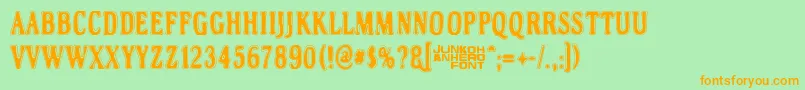 Helleplus32 Font – Orange Fonts on Green Background