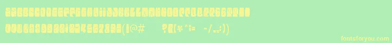 フォントElectorateboogaloo – 黄色の文字が緑の背景にあります