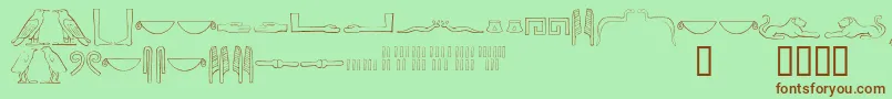 Ancientegyptianhieroglyphs-Schriftart – Braune Schriften auf grünem Hintergrund