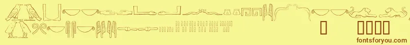 フォントAncientegyptianhieroglyphs – 茶色の文字が黄色の背景にあります。