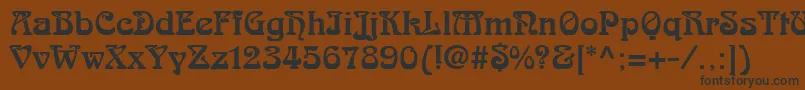 フォントArtDecoSsi – 黒い文字が茶色の背景にあります