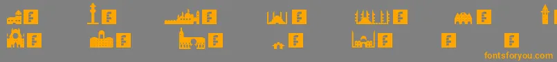 フォントIstanbul – オレンジの文字は灰色の背景にあります。