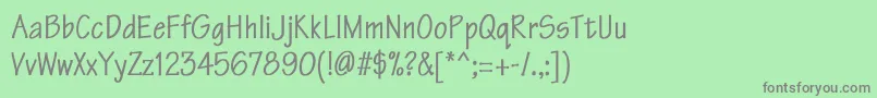 フォントTektonCnBold – 緑の背景に灰色の文字