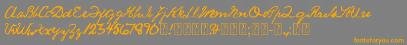 フォントSaucyJack – オレンジの文字は灰色の背景にあります。