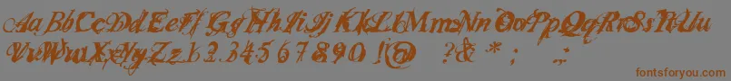 フォントInfiltri – 茶色の文字が灰色の背景にあります。