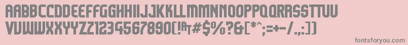 Komikazoom-Schriftart – Graue Schriften auf rosa Hintergrund