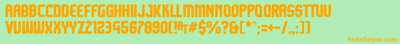Komikazoom-Schriftart – Orangefarbene Schriften auf grünem Hintergrund