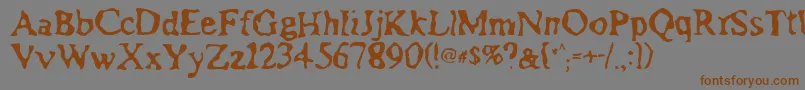 Assimilation Font – Brown Fonts on Gray Background