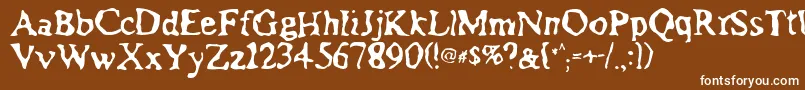 フォントAssimilation – 茶色の背景に白い文字