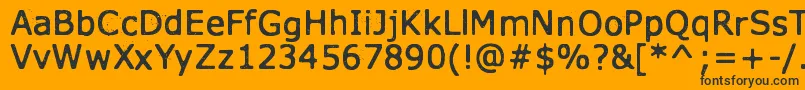 XmasYearZero Font – Black Fonts on Orange Background