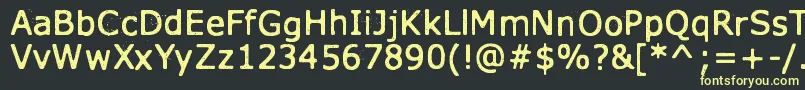 フォントXmasYearZero – 黒い背景に黄色の文字
