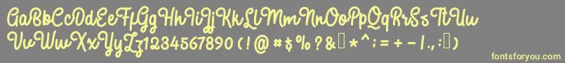 SweatyBeta Font – Yellow Fonts on Gray Background