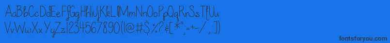 Fonte OurLilSecretForever – fontes pretas em um fundo azul