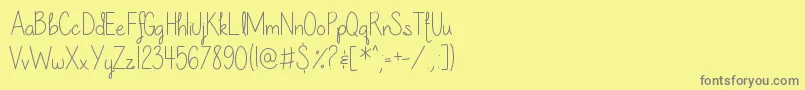 OurLilSecretForever-Schriftart – Graue Schriften auf gelbem Hintergrund