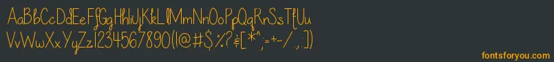 フォントOurLilSecretForever – 黒い背景にオレンジの文字