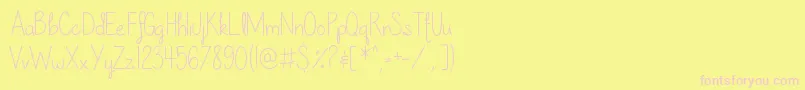 Fonte OurLilSecretForever – fontes rosa em um fundo amarelo