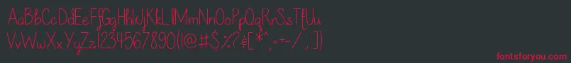 フォントOurLilSecretForever – 黒い背景に赤い文字