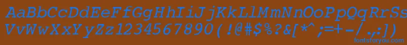 Czcionka CourierNormalItalic – niebieskie czcionki na brązowym tle