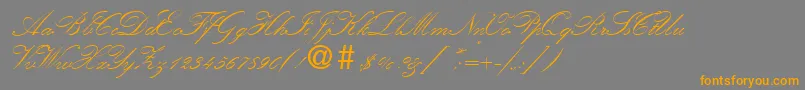 KremlinscripttwoRegular Font – Orange Fonts on Gray Background