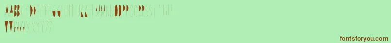 LineAndDraw-Schriftart – Braune Schriften auf grünem Hintergrund
