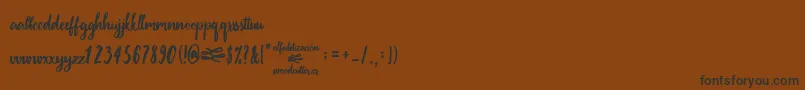 フォントAlfabetizaciРІn – 黒い文字が茶色の背景にあります