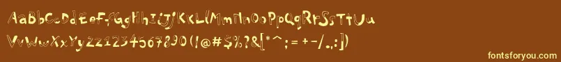 PfplayskoolproHalfull-fontti – keltaiset fontit ruskealla taustalla