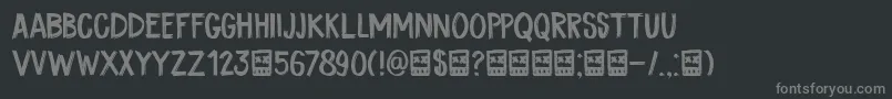 DkCoalBrush-fontti – harmaat kirjasimet mustalla taustalla