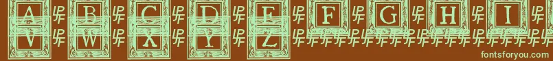 QuanauticaleInitialsNo2-fontti – vihreät fontit ruskealla taustalla