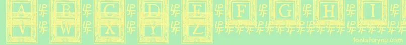QuanauticaleInitialsNo2-Schriftart – Gelbe Schriften auf grünem Hintergrund