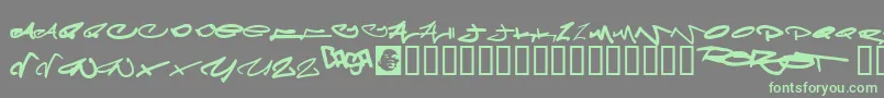 フォントMeglaphoid – 灰色の背景に緑のフォント
