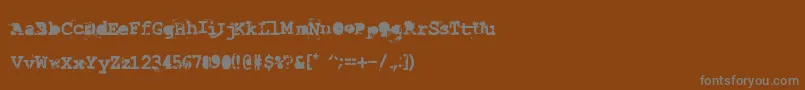 フォントLastDraft – 茶色の背景に灰色の文字