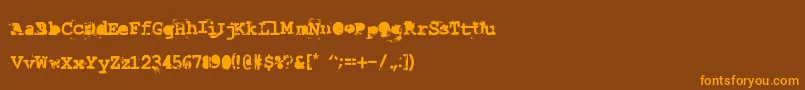 フォントLastDraft – オレンジ色の文字が茶色の背景にあります。