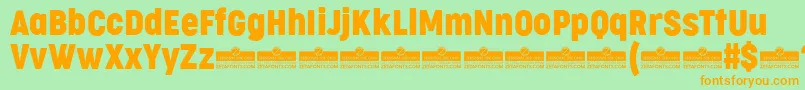 CocogooseCondensedRegularTrial Font – Orange Fonts on Green Background