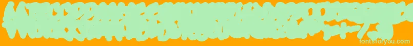 UrbanScrawlDown-Schriftart – Grüne Schriften auf orangefarbenem Hintergrund