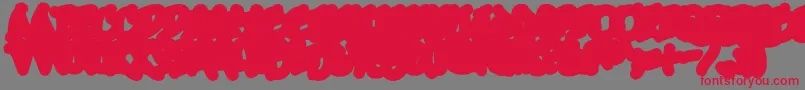 UrbanScrawlDown-Schriftart – Rote Schriften auf grauem Hintergrund